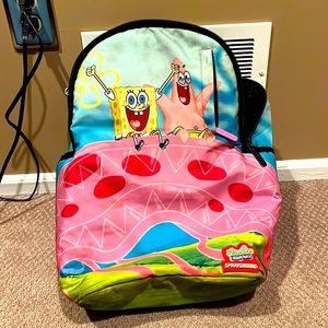 Spray ground backpack